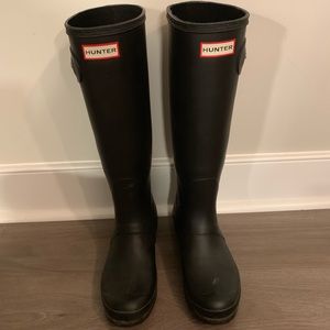 Tall black hunter rain boots